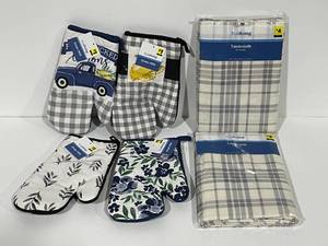 lot 66 image: True Living Tablecloths and Oven Mitts