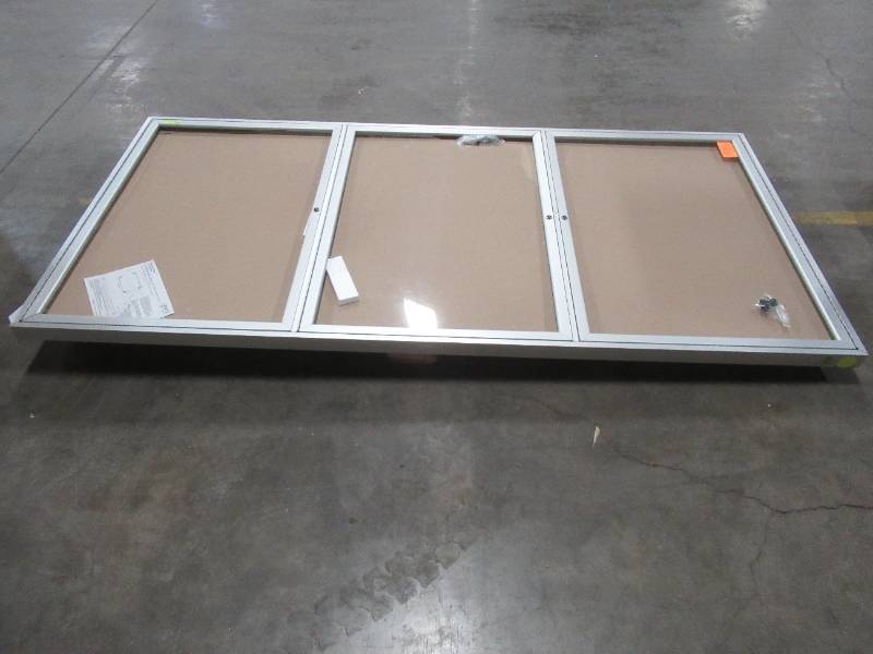 lot 400 image: Ghent 3 Door Enclosed Fabric Bulletin Board, Silver Frame, 96W x 48H - Plexi Glass needs replacing.