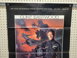 lot 1479 image: 1982 Clint Eastwood Firefox Original One Sheet Movie Poster - 25 x 34-12 - Looks like an Original that someone trimmed the white border and the credits off