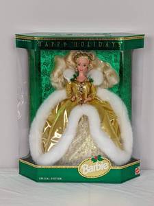 lot 33 image: New and Collectible Vintage Mattel Happy Holiday Barbie #12155
