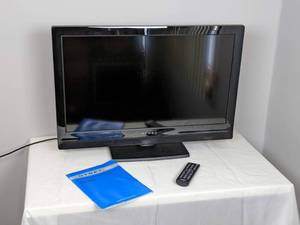 lot 65 image: Black Dynex 32 TV with Remote