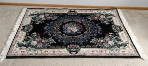 lot 88 image: Medium Sized Floral Area Rug