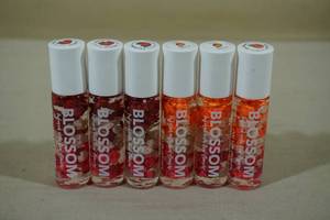 lot 72 image: Blossom Flower Infused Roll On Lip Gloss