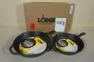 lot 77 image: Lodge Seasoned Cast Iron Skillets