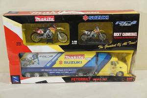 lot 12 image: Rare Die Cast Suzuki Racing Team Ricky Carmichael Farewell Hauler Set