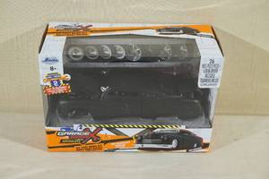 lot 26 image: Jada Toys Garage Worx Kustom 1951 Mercury Die Cast Model Kit