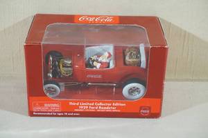 lot 29 image: Coca-Cola 1929 Ford Roadster with Santa 125 Scale Die Cast Car