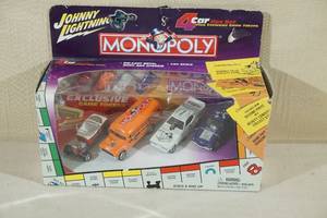 lot 32 image: Johnny Lightning Special Edition Monopoly Car and Token Set