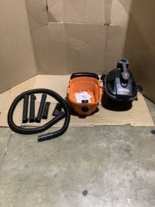 RIDGID 4 Gallon 5.0-Peak HP Portable WetDry Shop Vacuum with Fine Dust Filter, Hose and Accessories. See Pictures