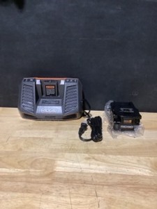 RIDGID 18V Lithium-Ion MAX Output 4.0 Ah Battery and Charger Starter Kit. See Pictures