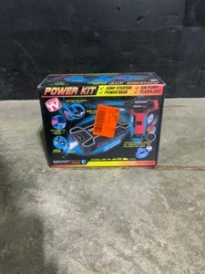lot 32 image: Smartech Products Power Kit TECH-5000P Vehicle Jump Starter and Power Bank with Accessories  Air Compressor  Carrying Case. See Pictures