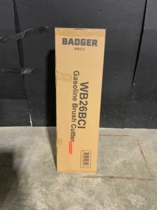 lot 57 image: Badger 26 cc 2-Cycle 2-in-1 Gas Full Crank Straight Shaft Grass Trimmer with Brush Cutter Blade and Bonus Harness. See Pictures