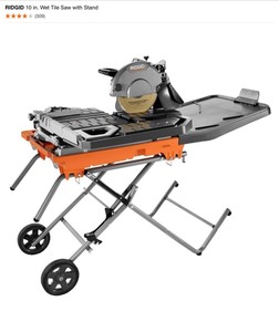 lot 66 image: RIDGID 10 in. Wet Tile Saw with Stand. See Pictures