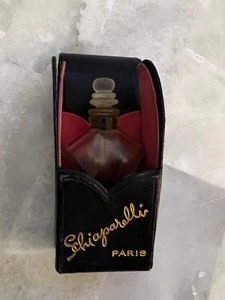 lot 19 image: Antique Schiaparelli Shocking Perfume Bottle with Leather Case