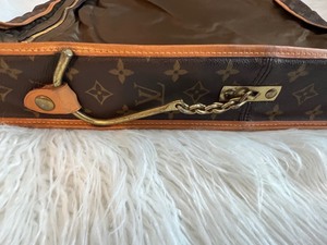 lot 47 image: Louis Vintage Folding Garment Bag Monogrammed Canvas Soft Luggage