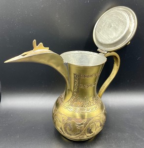 lot 102 image: Iskanadar Matar & Sons of Nazareth Brass Pitcher
