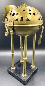 lot 105 image: Ornate Brass Elephant Incense Burner or Candle Holder by Manorisms, Inc.