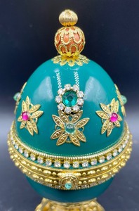 lot 144 image: Decorative Egg Music Trinket Box