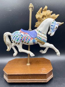lot 114 image: Two Porcelain Carousal Horse Figurines