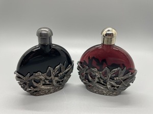 lot 212 image: Perfume Bottles with Metal Accents