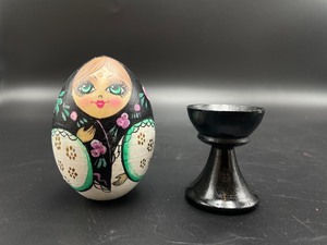 lot 239 image: Hand Painted Wooden Egg with a Stand