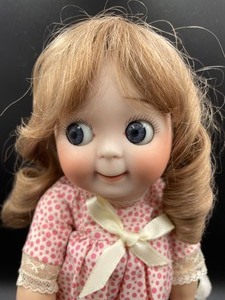 lot 196 image: Butler Reproduction Doll
