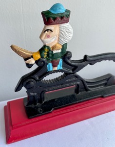 lot 286 image: Cast Iron Nutcracker on a Wooden Base