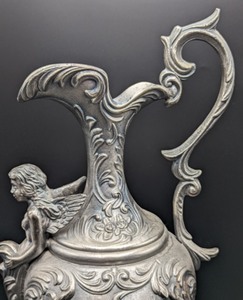 lot 6 image: Italian Figural Ewer with Cherubs