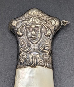 lot 323 image: Antique Sterling and Mother of Pearl Baby Rattle