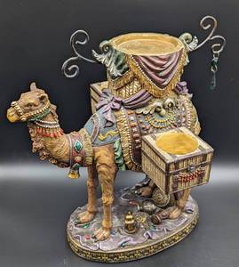 lot 381 image: Decorative Camel Candleholders