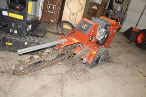 lot 111 image: Charles Machine Works Ditch Witch Walk-Behind Trencher C16X with Single Axle Utility Trailer