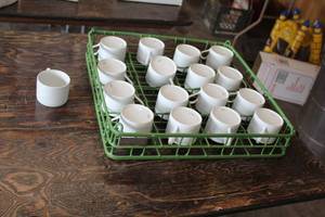 lot 435 image: Lot of (17) Schmidt Ceramic Coffee Mugs, Mug Rack
