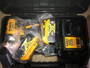 lot 38 image: DEWALT 20-Volt MAX XR Cordless Brushless 3-Speed 14 in. Impact Driver with (2) 20-Volt 4.0Ah Batteries & Charger