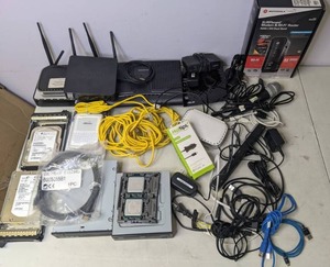 lot 198 image: An Array of Cables, Modems, Disk Drives, Routers & More Seagate, Fujitsu, Motorola, Cisco, Netgear - Z