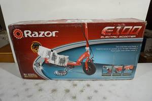 lot 37 image: Razor E100 Electric Scooter - Red
