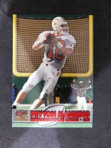 lot 42 image: 1998 Pacific Revolution Touchdown Laser Cuts Peyton Manning Rookie Card #10