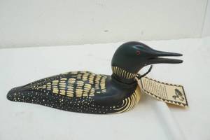 lot 67 image: hand carved loon