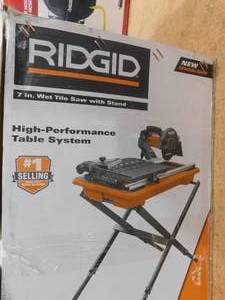 lot 1 image: RIDGID 9 Amp Corded 7 in. Wet Tile Saw with Stand