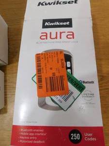 lot 57 image: Kwikset Aura Satin Nickel Single Cylinder Electronic Bluetooth Keypad Smart Lock Deadbolt featuring SmartKey Security