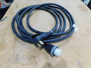 lot 85 image: 25 50 amp RV Power Cord
