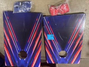 lot 18 image: Premium Cornhole Sets Options Available with 8 Bean Bag LED Firework Color Open box scratches present see pictures