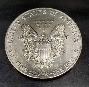 1987 AMERICAN SILVER EAGLE 1 TROY OZ .999 FINE SILVER DOLLAR