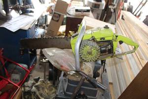 lot 19 image: Vintage Poulan Chainsaw