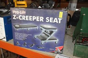 lot 39 image: Pro-Lift Z-Creeper Seat (in original box)
