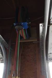 lot 60 image: Acetylene Torch Equipment - (2) Regulators, 50 Hoses, Hose Reel