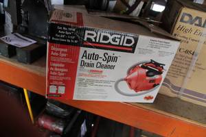 lot 82 image: Ridgid Auto-Spin Drain Cleaner (in box)