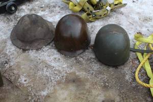 lot 151 image: Vintage Military Helmets