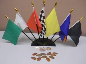 lot 17 image: INDIANAPOLIS MOTOR SPEEDWAY HATLAPEL PINS, PRESSED SOUVENIR PENNIES & INDIANAPOLIS MOTOR SPEEDWAY DESKTOP 7 FLAG DISPLAY - NICE SET - NICE - SEE PICTURES