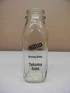 lot 27 image: INDIANAPOLIS 500 TAKUMA SATO WINNING DRIVER REPLICA MILK BOTTLE - MAY 28TH 2017 - AWESOME PIECE - SEE PICTURES