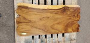 Solid Wood Live Edge Walnut Vanity Top (TOP ONLY).  Approximate Dimensions 48 x 21 x 2.3 - Slight Scratch and Dent, Slight mold growth from sitting in warehouse (can be sandedremoved). NO RESERVE